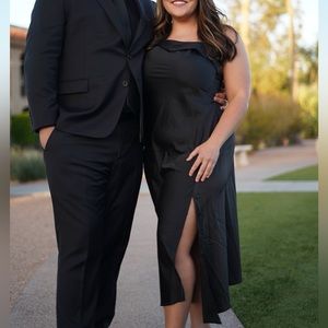 Black asymmetrical midi satin dress